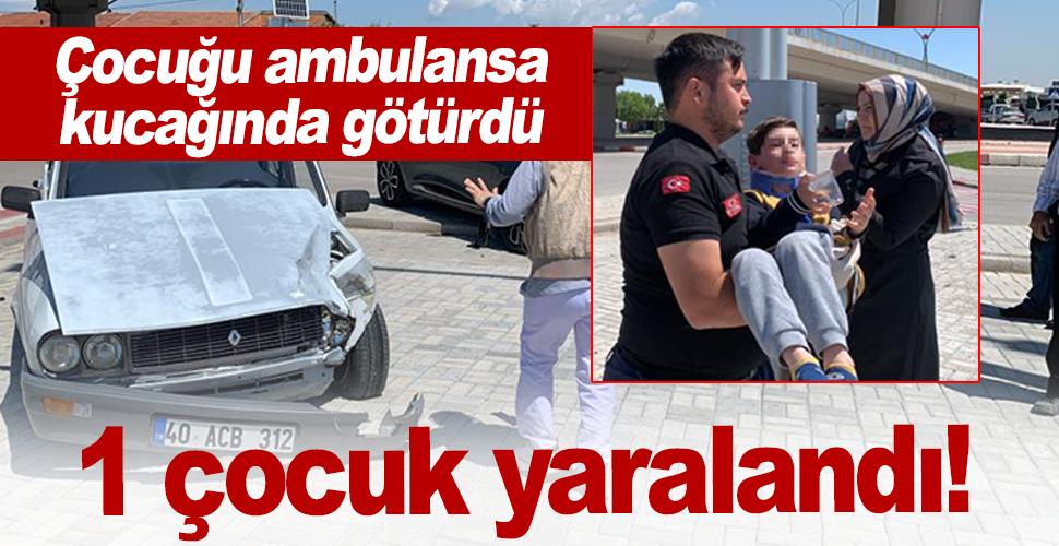 Karaman'da kazada yaralanan çocuğu ambulansa kucağında götürdü